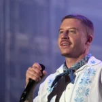 The Unyielding Voice: Macklemore Returns to the Stage Amidst Global Solidarity Controversy